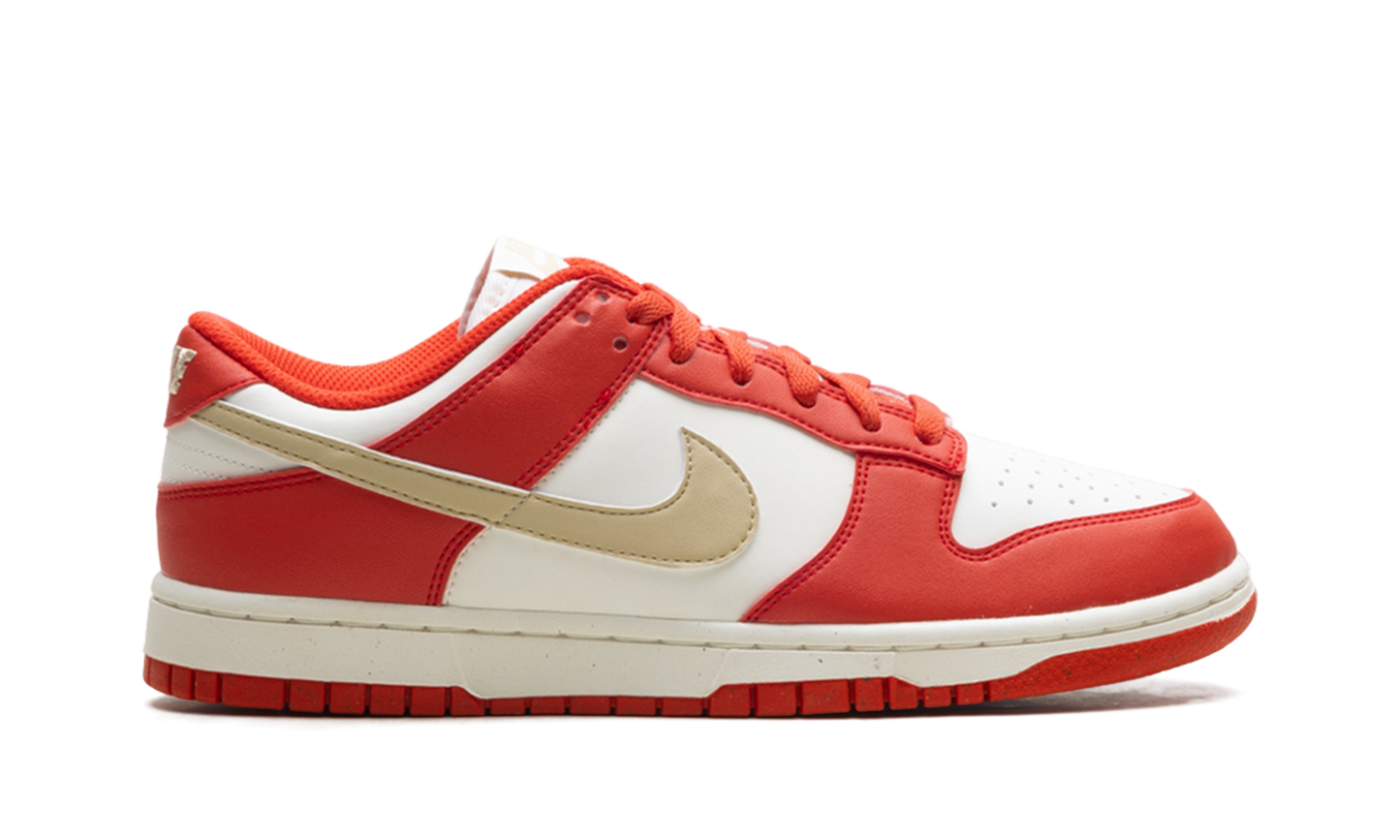 Dunk Low Next Nature WMNS "Light Crimson Team Gold"