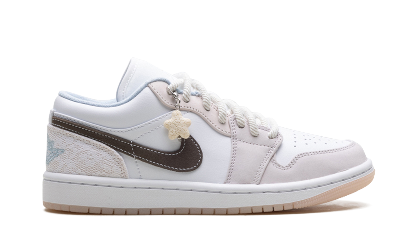 Jordan 1 Low WMNS "Coral"