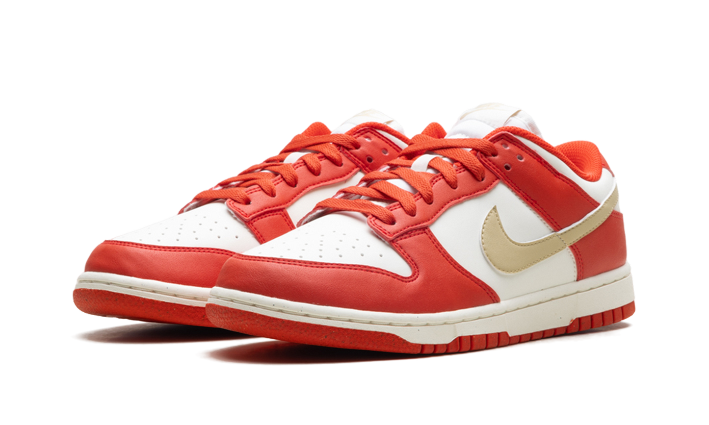 Dunk Low Next Nature WMNS "Light Crimson Team Gold"