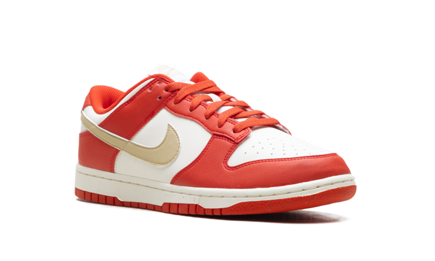 Dunk Low Next Nature WMNS "Light Crimson Team Gold"